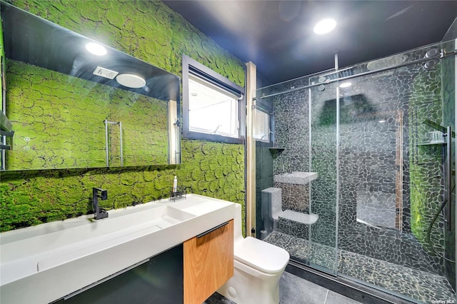 110 Schooner Ln, Copiague, NY 11726 - full bathroom featuring vanity, toilet, a shower stall, and tile patterned flooring