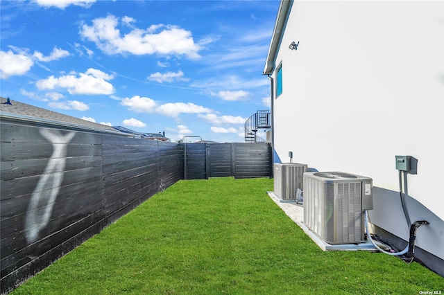 110 Schooner Ln, Copiague, NY 11726 - view of yard with a fenced backyard and central AC