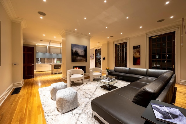 422 Hardscrabble Rd, North Salem, NY 10560 - living room with light wood-type flooring, ornamental molding, and visible vents