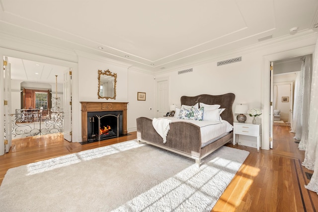 422 Hardscrabble Rd, North Salem, NY 10560 - bedroom featuring visible vents, wood finished floors, and ornamental molding