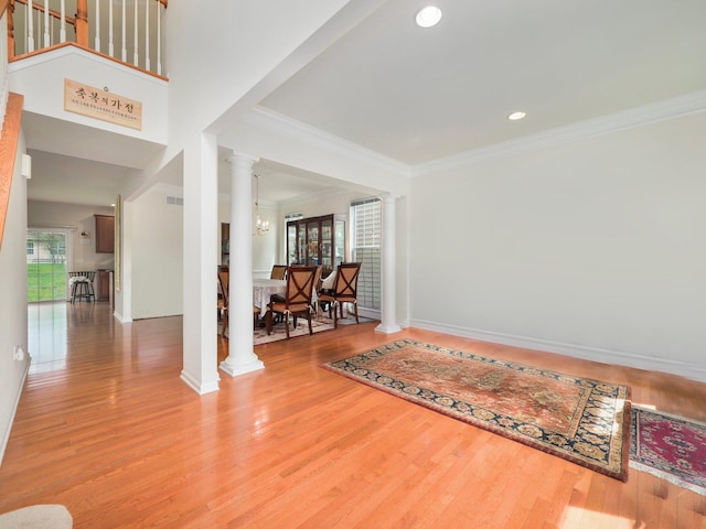 417 Vassar Pl, Fishkill, NY 12524 - interior space with ornate columns, ornamental molding, baseboards, and wood finished floors