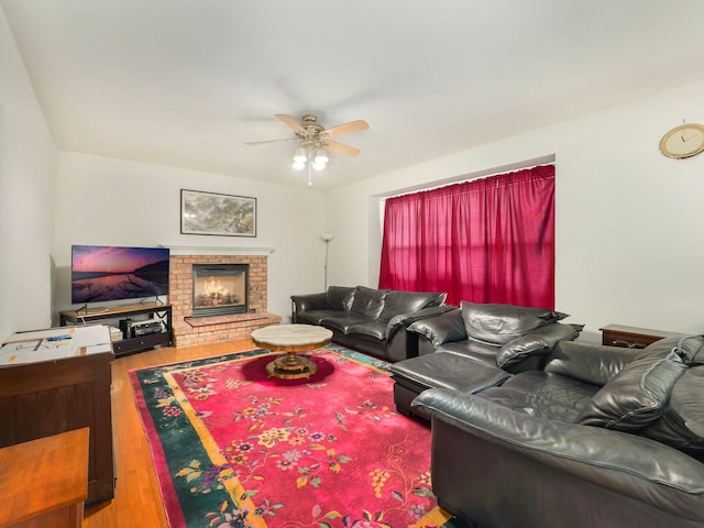 417 Vassar Pl, Fishkill, NY 12524 - living room with a ceiling fan, wood finished floors, and a fireplace