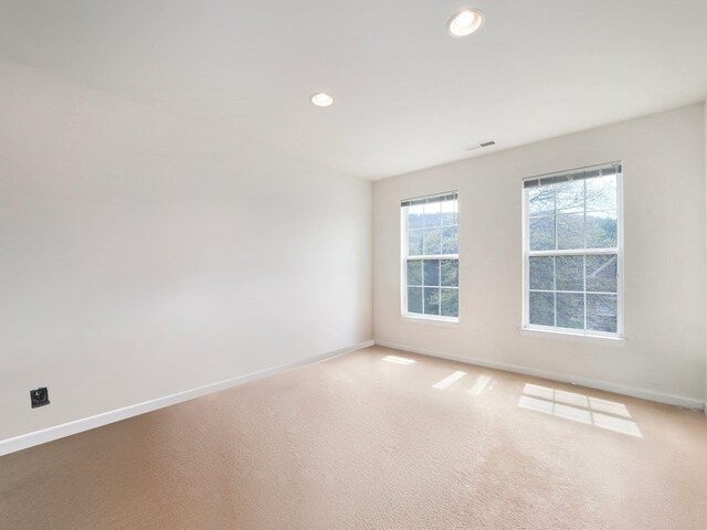 417 Vassar Pl, Fishkill, NY 12524 - empty room featuring visible vents, recessed lighting, baseboards, and light colored carpet