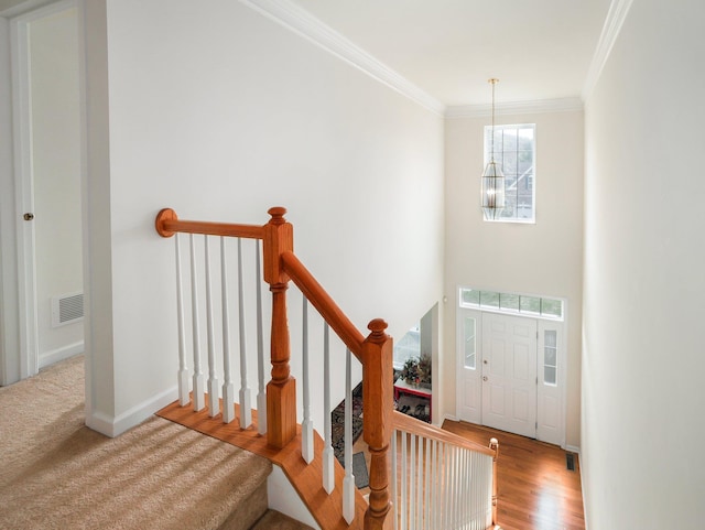 417 Vassar Pl, Fishkill, NY 12524 - entryway featuring baseboards, visible vents, and ornamental molding