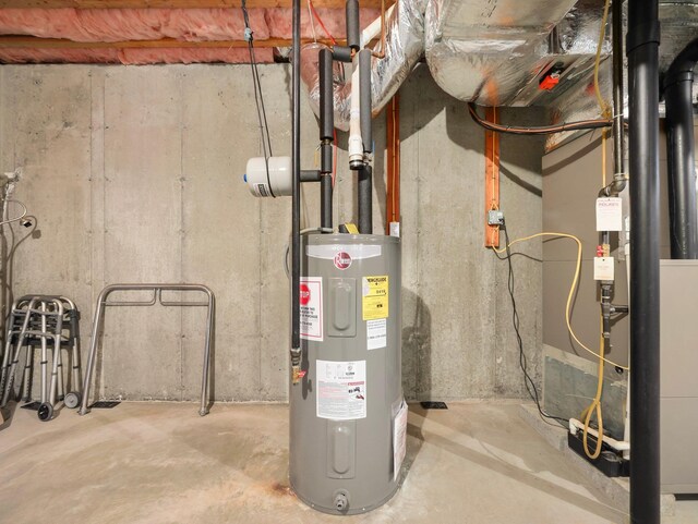 417 Vassar Pl, Fishkill, NY 12524 - utility room with heating unit and electric water heater