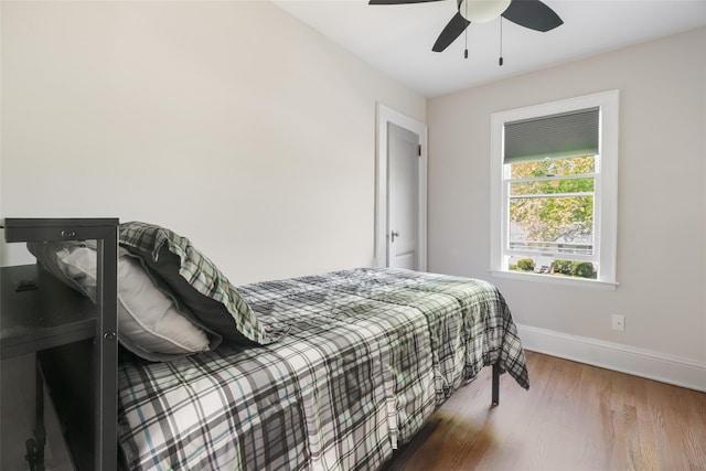 67 Arnett Rd, Rhinebeck, NY 12572 - bedroom with wood finished floors, baseboards, and a ceiling fan