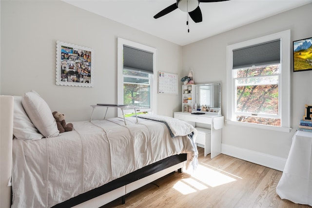 67 Arnett Rd, Rhinebeck, NY 12572 - bedroom featuring light wood-style floors, baseboards, and ceiling fan
