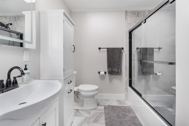 67 Arnett Rd, Rhinebeck, NY 12572 - bathroom with toilet, ornamental molding, vanity, marble look tile flooring, and enclosed tub / shower combo