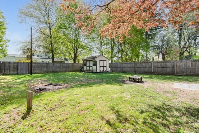 67 Arnett Rd, Rhinebeck, NY 12572 - view of yard featuring an outdoor fire pit, a storage shed, and an outdoor structure