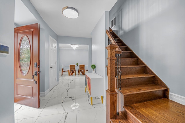 66 Rockland Dr, Jericho, NY 11753 - entryway with baseboards, light marble finish floors, and stairs