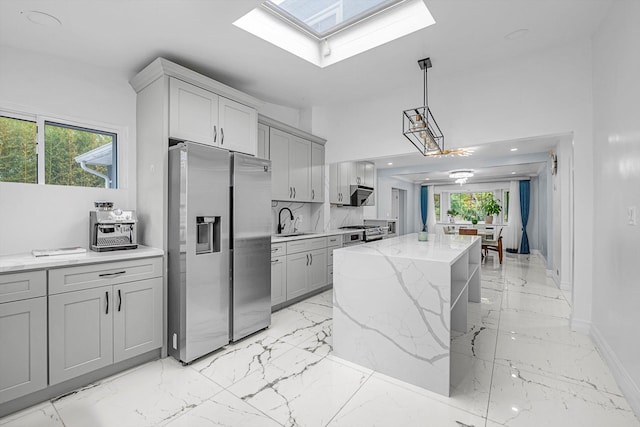 66 Rockland Dr, Jericho, NY 11753 - kitchen with appliances with stainless steel finishes, gray cabinets, light marble finish floors, and recessed lighting