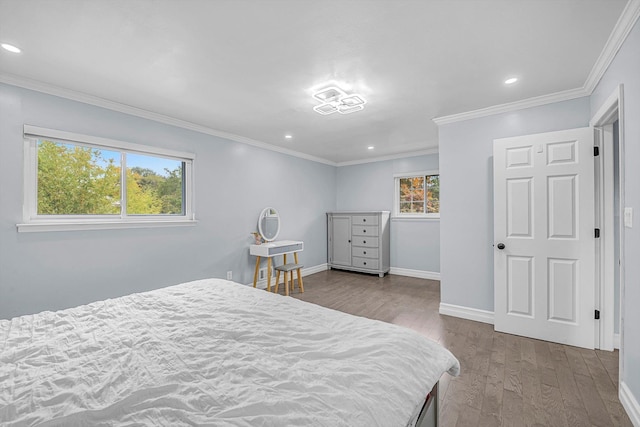 66 Rockland Dr, Jericho, NY 11753 - bedroom featuring wood finished floors, recessed lighting, baseboards, and ornamental molding