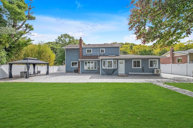 66 Rockland Dr, Jericho, NY 11753 - rear view of property with a gazebo, a chimney, and a patio area
