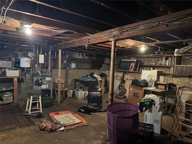 unfinished below grade area featuring a heating unit