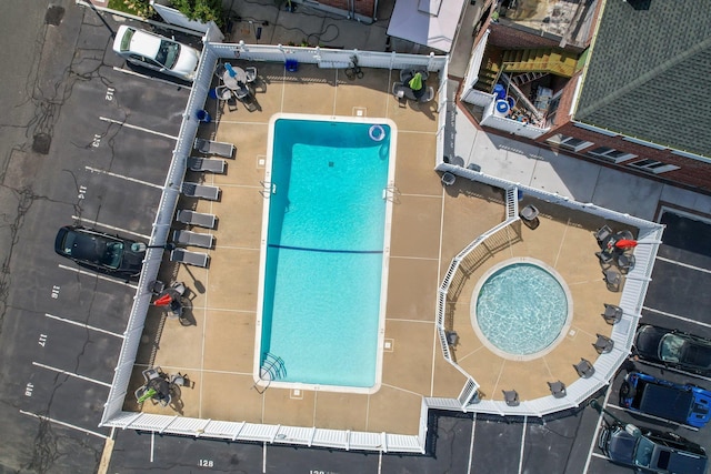 drone / aerial view of a pool area