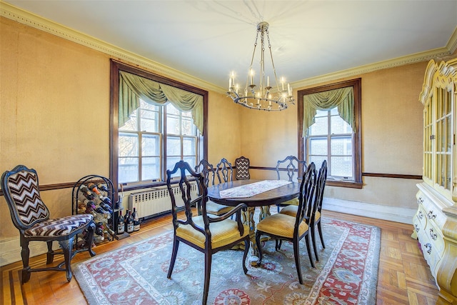 34-06 81st Unit 42, Jackson Heights, NY 11372 - dining area featuring ornamental molding, a notable chandelier, a healthy amount of sunlight, and radiator heating unit