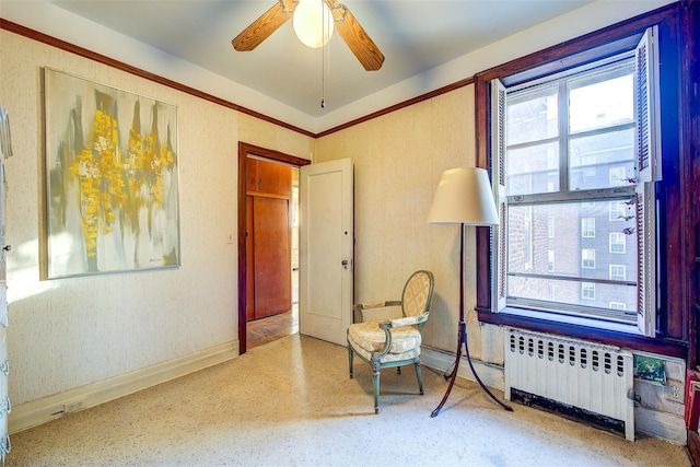 34-06 81st Unit 42, Jackson Heights, NY 11372 - living area with ceiling fan, radiator, baseboards, and speckled floor