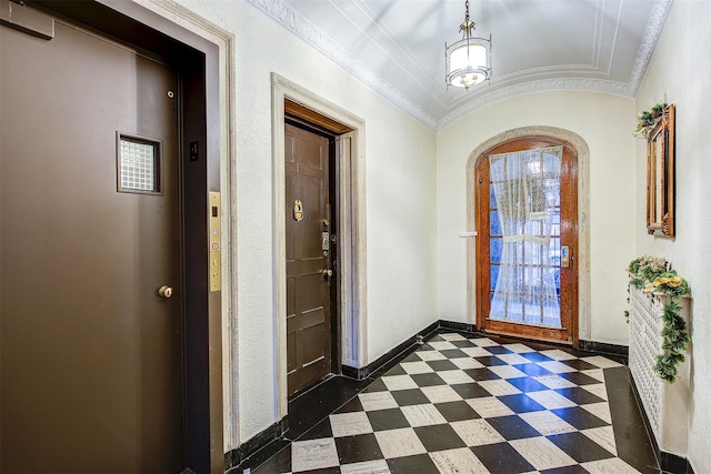 34-06 81st Unit 42, Jackson Heights, NY 11372 - foyer with crown molding, baseboards, elevator, and dark floors