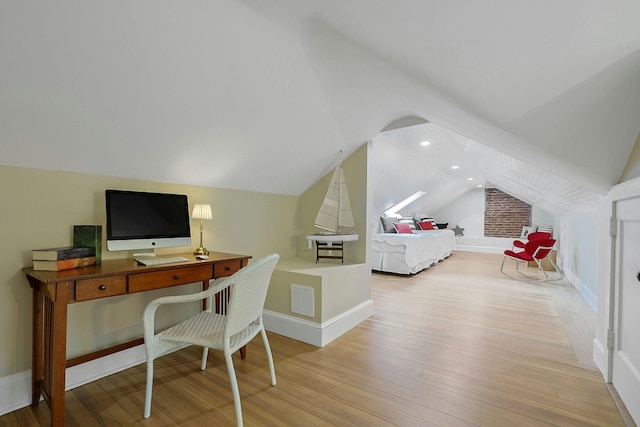 490 Bellwood Ave, Sleepy Hollow, NY 10591 - bedroom with vaulted ceiling, wood finished floors, baseboards, and an office area