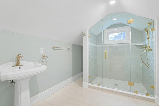 490 Bellwood Ave, Sleepy Hollow, NY 10591 - bathroom featuring vaulted ceiling, a shower stall, baseboards, wood finished floors, and recessed lighting
