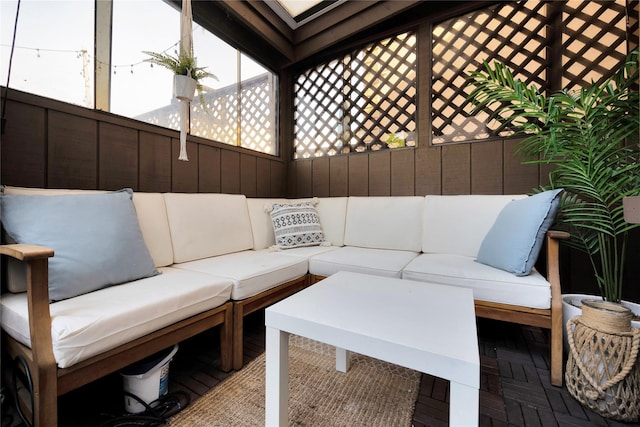 view of patio / terrace featuring an outdoor hangout area and fence