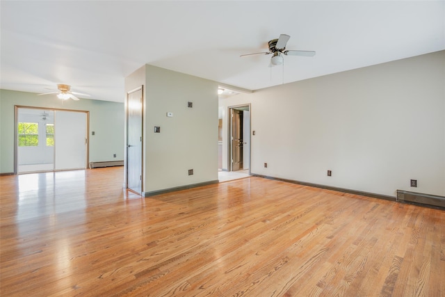 59 Longdale Rd, Mahopac, NY 10541 - unfurnished room featuring ceiling fan, light wood-style flooring, a baseboard heating unit, and baseboards