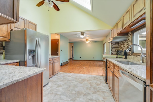 59 Longdale Rd, Mahopac, NY 10541 - kitchen with appliances with stainless steel finishes, ceiling fan, a sink, under cabinet range hood, and high vaulted ceiling