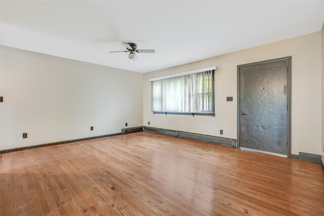 59 Longdale Rd, Mahopac, NY 10541 - unfurnished room with ceiling fan, light wood-type flooring, baseboard heating, and baseboards