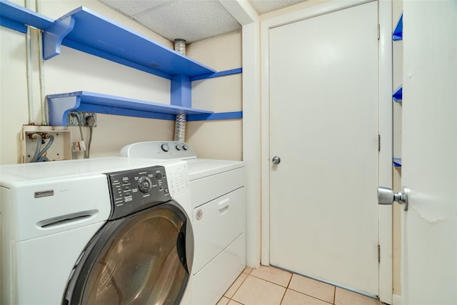 59 Longdale Rd, Mahopac, NY 10541 - clothes washing area with washer and dryer and light tile patterned floors