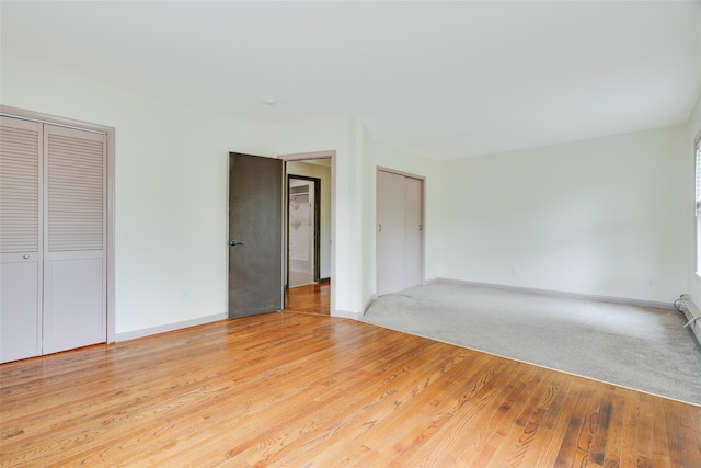 59 Longdale Rd, Mahopac, NY 10541 - unfurnished bedroom featuring baseboards, light wood-type flooring, and a closet