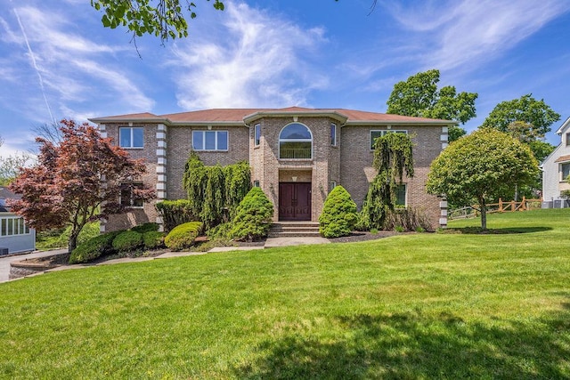 view of front facade featuring brick siding