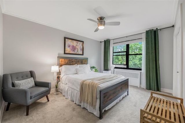 52 Rockledge Rd Unit 2A, Hartsdale, NY 10530 - bedroom with radiator, crown molding, light colored carpet, ceiling fan, and baseboards