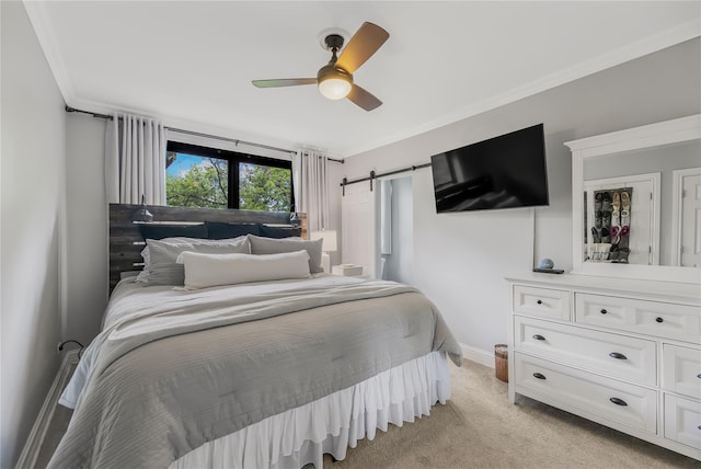 52 Rockledge Rd Unit 2A, Hartsdale, NY 10530 - bedroom with light colored carpet, a barn door, baseboards, ceiling fan, and ornamental molding