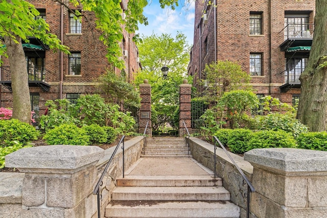view of property's community featuring stairs