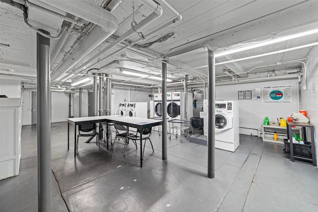 unfinished below grade area with independent washer and dryer