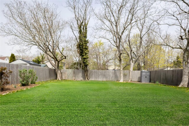 416 W St, Greenport, NY 11944 - view of yard with a fenced backyard
