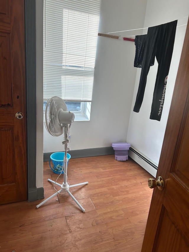 45 S Lander St, Newburgh, NY 12550 - interior space with a baseboard heating unit and light wood finished floors