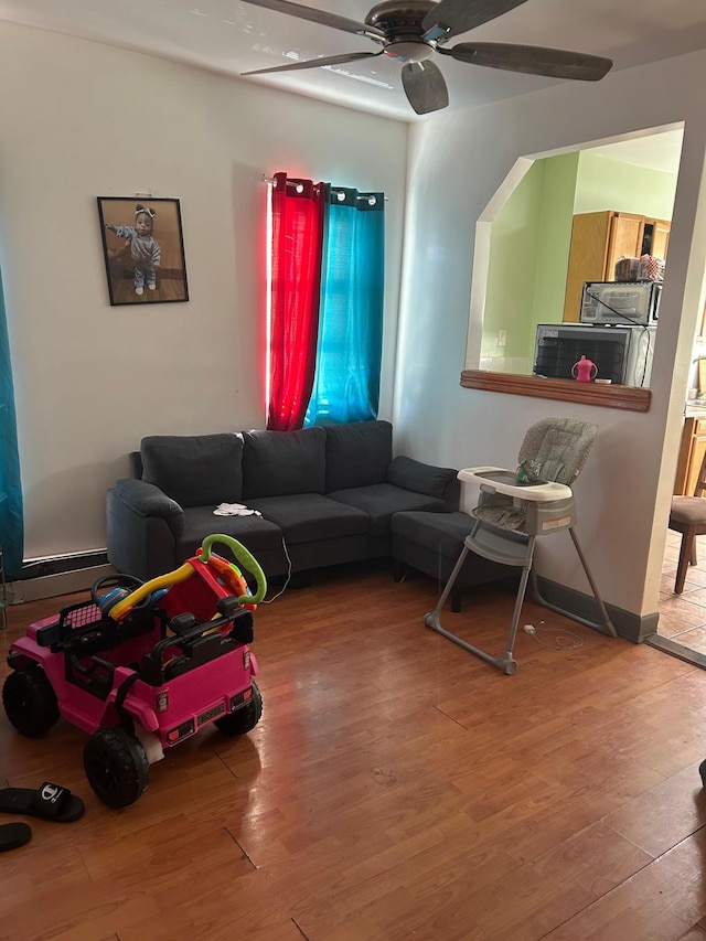 45 S Lander St, Newburgh, NY 12550 - living room featuring light wood-style flooring and ceiling fan