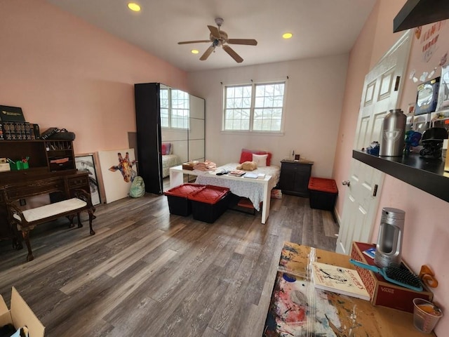 bedroom featuring ceiling fan, recessed lighting, and wood finished floors