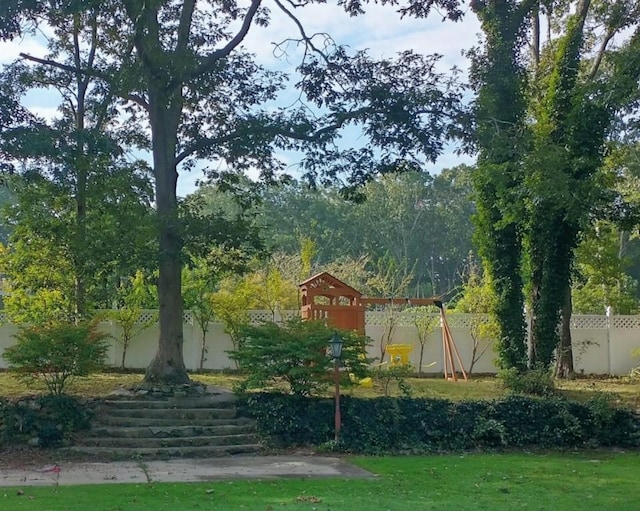 7 Mortimer St, Westhampton Beach, NY 11978 - view of yard featuring fence