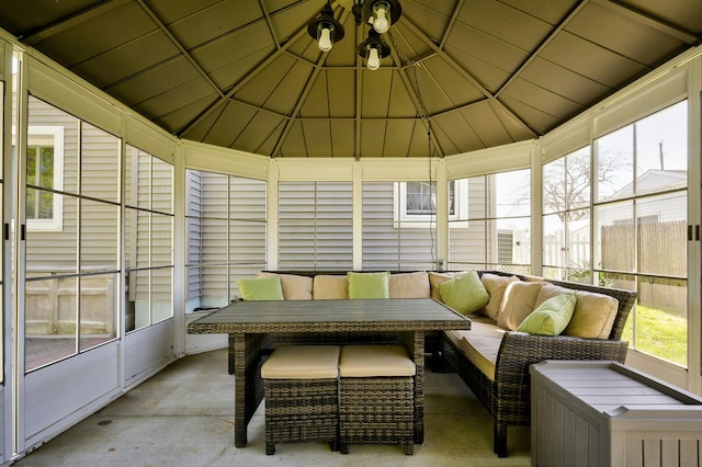 sunroom / solarium featuring outdoor lounge area