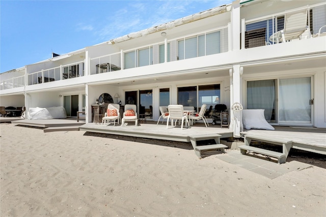 279 Dune Rd Unit 2, Westhampton Beach, NY 11978 - rear view of property with a wooden deck