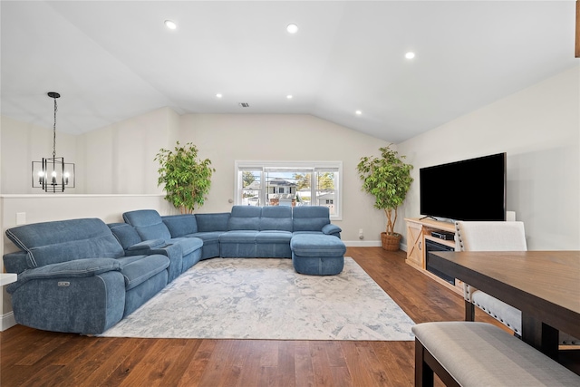 living room featuring a chandelier, vaulted ceiling, wood finished floors, and recessed lighting