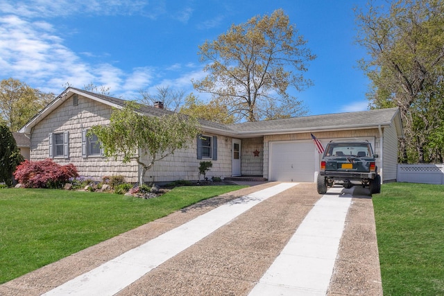 ranch-style house featuring a chimney, driveway, an attached garage, and a front yard