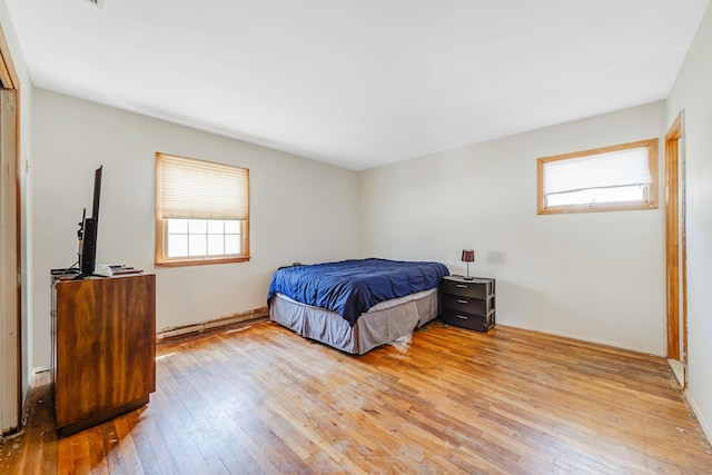 bedroom with light wood-style floors