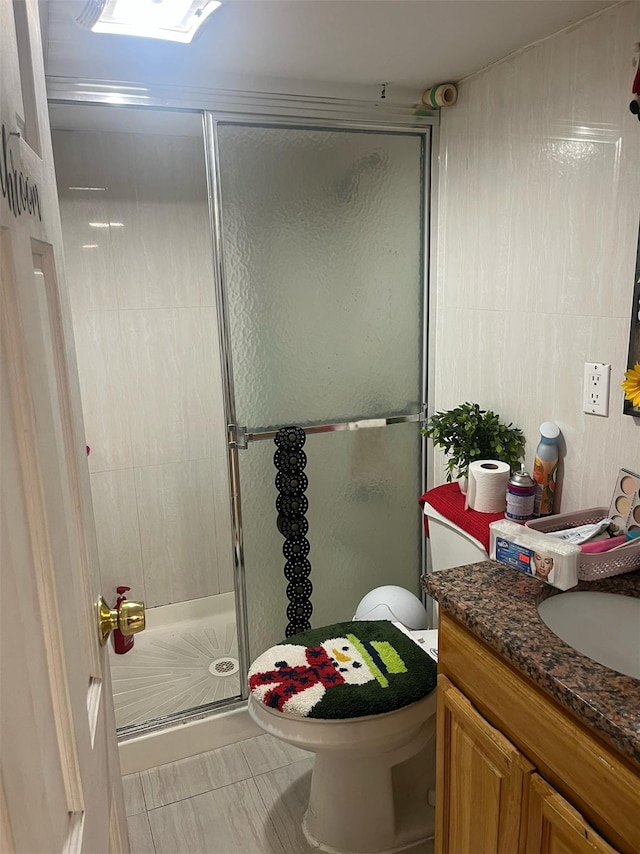 2045 121st St, College Point, NY 11356 - full bathroom with a shower stall, vanity, and toilet