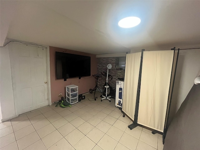 2045 121st St, College Point, NY 11356 - interior space featuring light tile patterned floors and brick wall