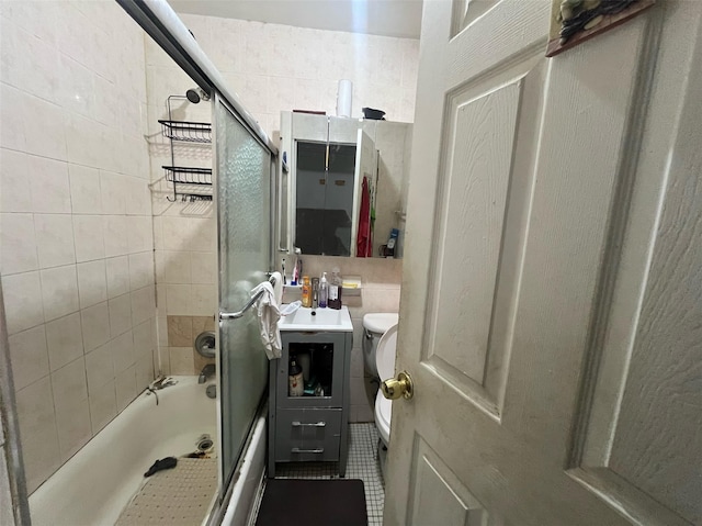 2045 121st St, College Point, NY 11356 - bathroom with toilet, enclosed tub / shower combo, and tile patterned flooring