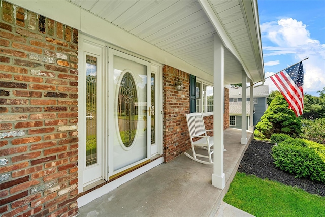35 Capt Faldermeyer Dr, Stony Point, NY 10980 - view of exterior entry featuring a porch and brick siding