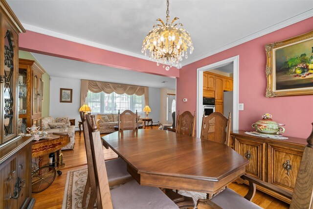 35 Capt Faldermeyer Dr, Stony Point, NY 10980 - dining area featuring a chandelier and light wood-style floors